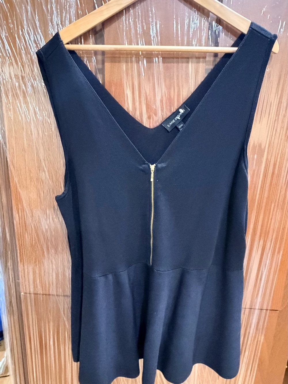 Lane Bryant Black Sleeveless V-Neck Peplum top with Gold Zip